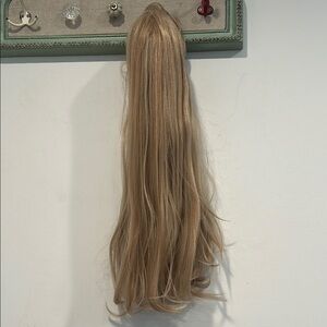 Dolls Kill long blonde oops I did it again wing with hair combs